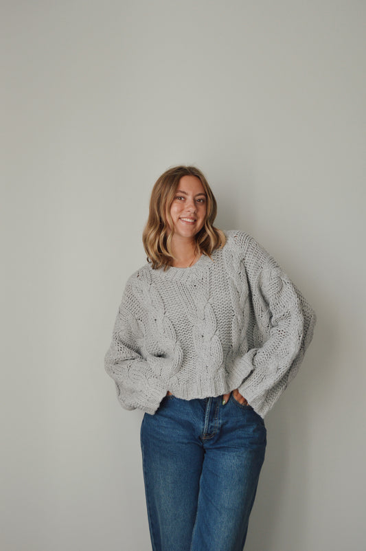 CLOUDY DAY CABLE KNIT SWEATER