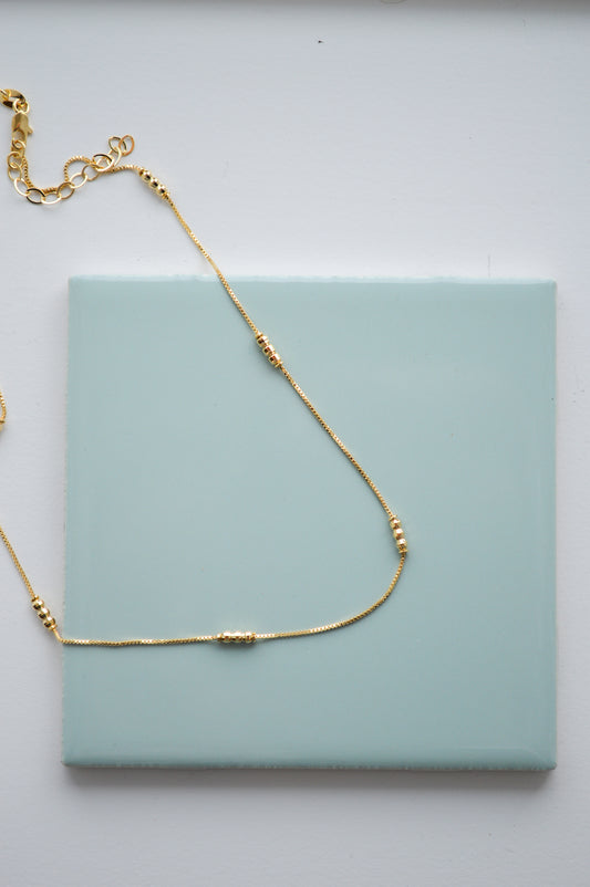 three peas in a pod gold necklace