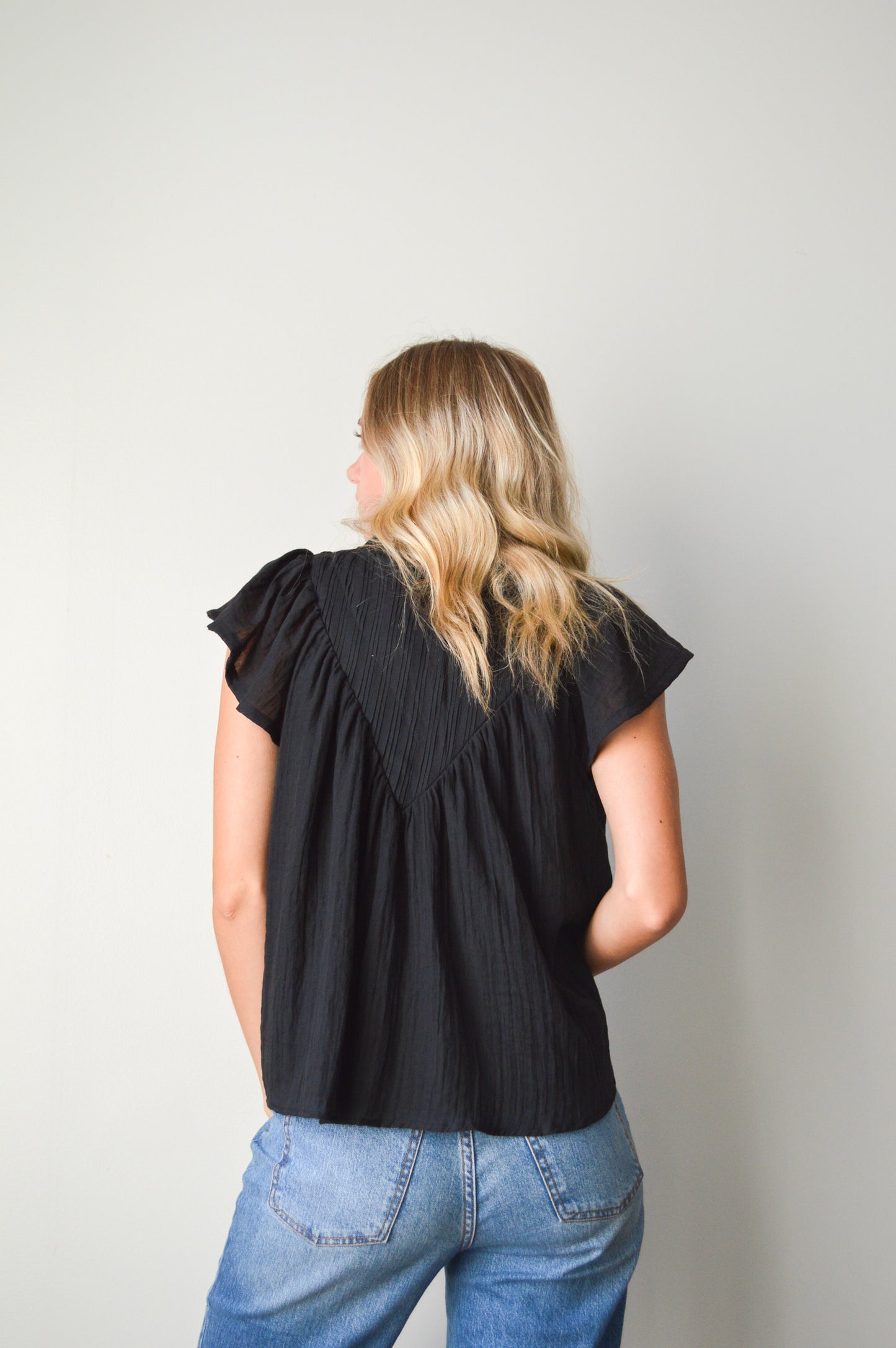 ASPEN BLACK RUFFLE BLOUSE