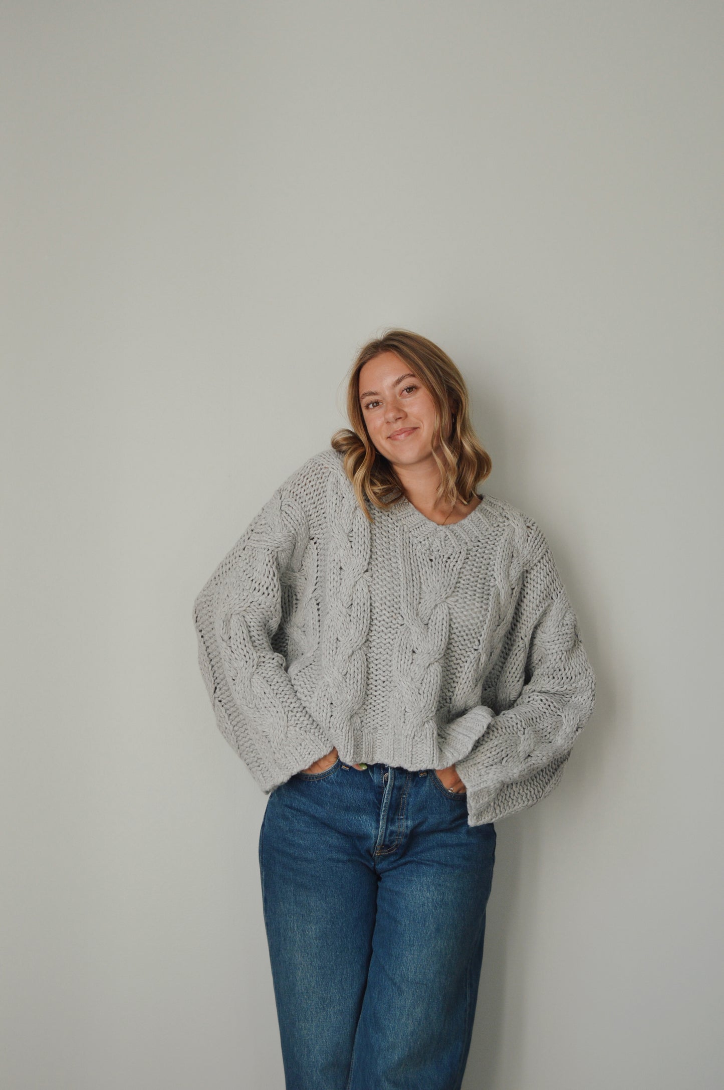 CLOUDY DAY CABLE KNIT SWEATER