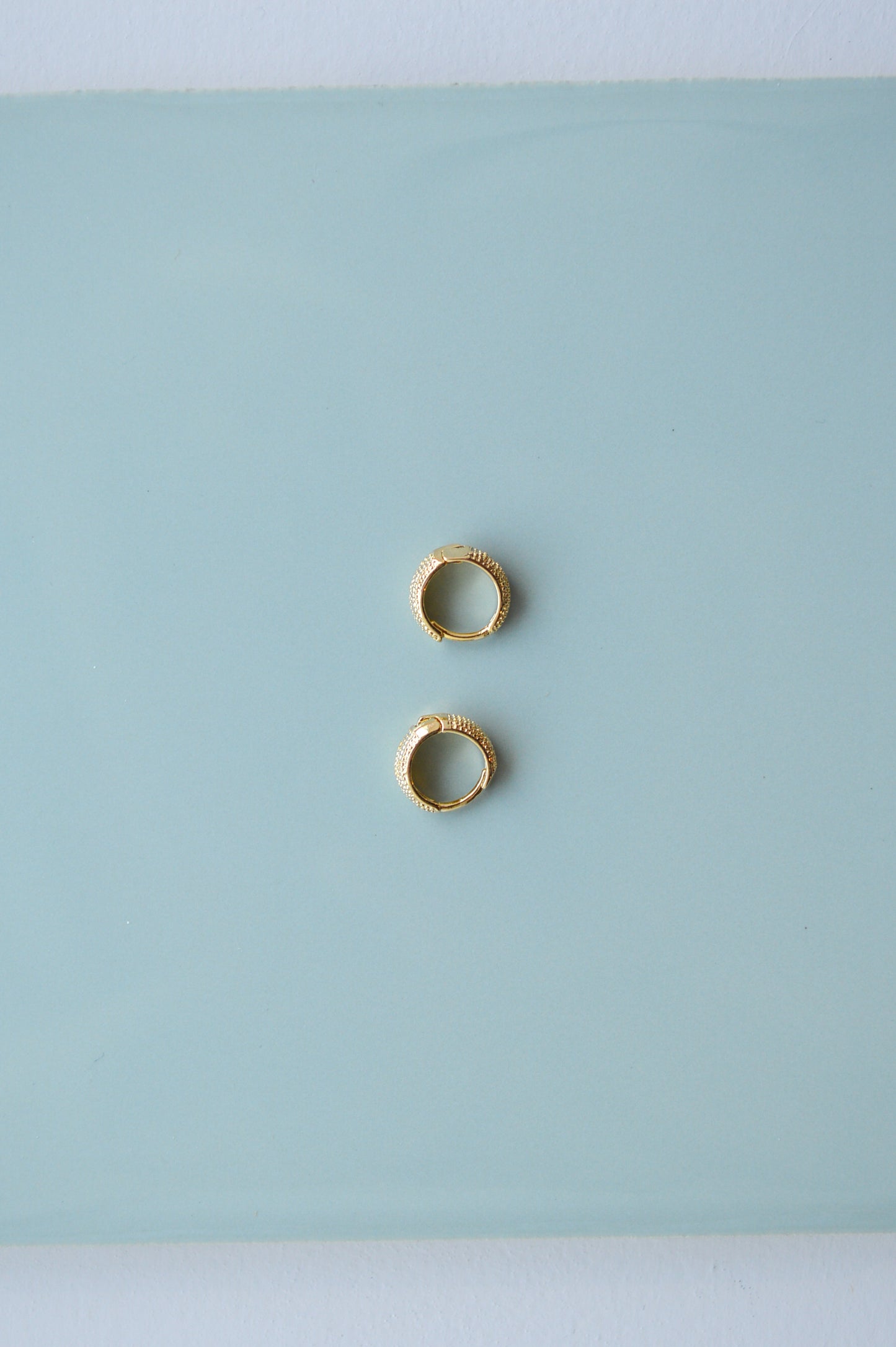 ivonne gold textured clicker hoops