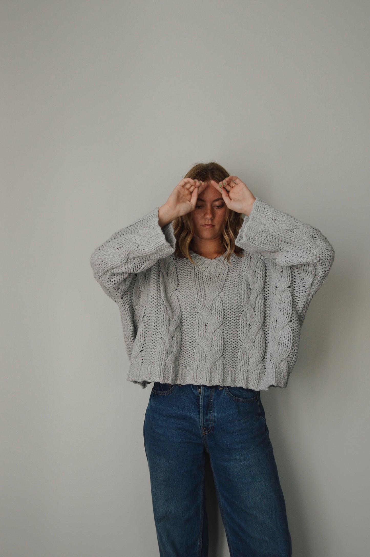 CLOUDY DAY CABLE KNIT SWEATER